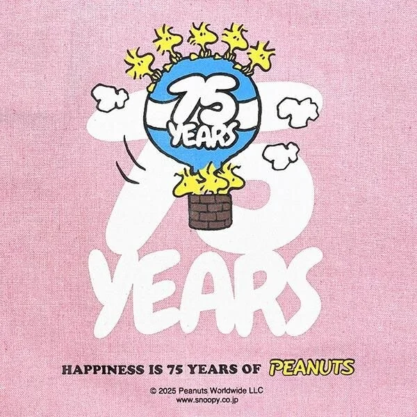 ウッドストックがバルーンに乗るイラスト