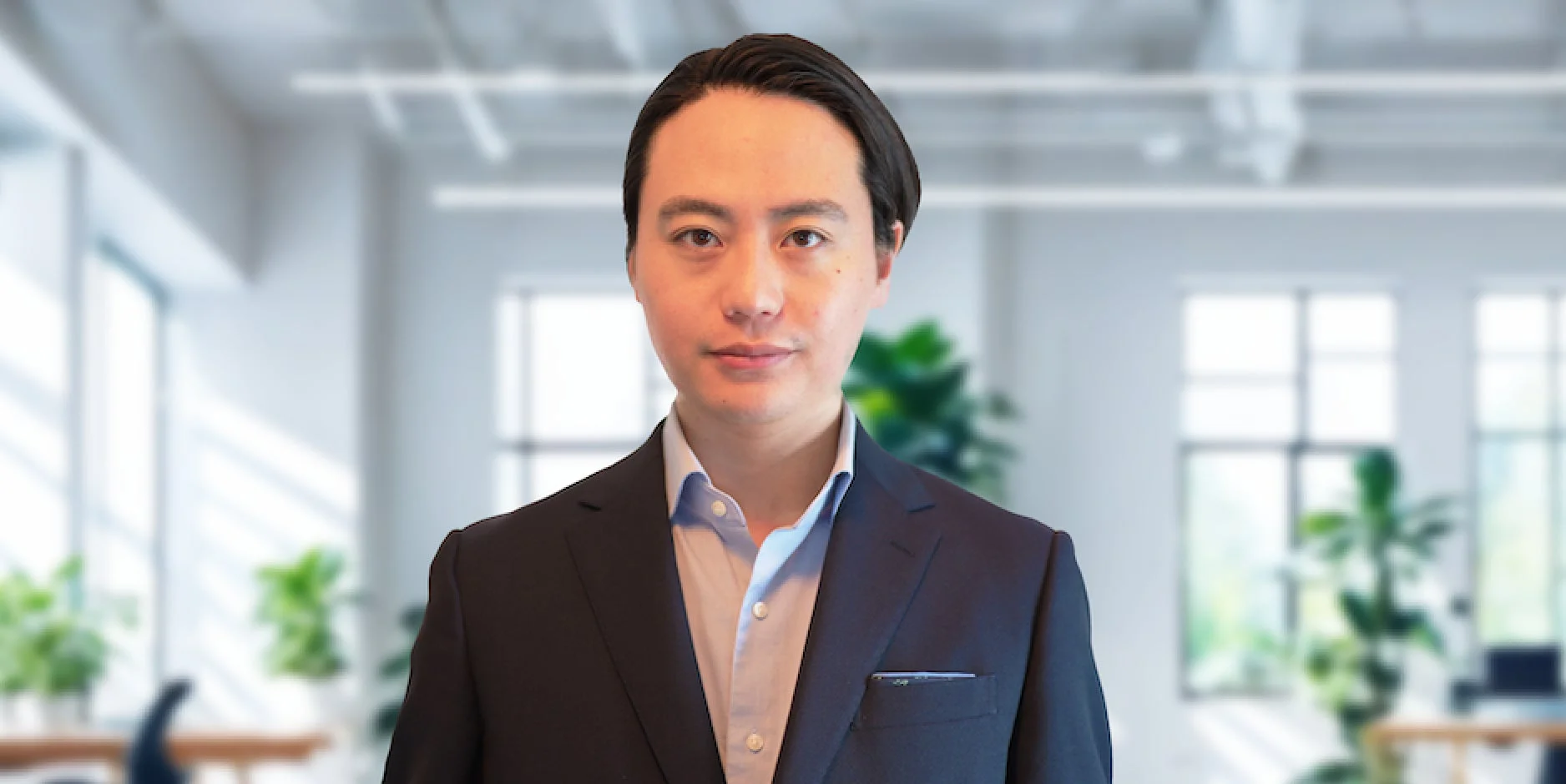 ビジネススーツを着用したアジア系の男性のポートレート