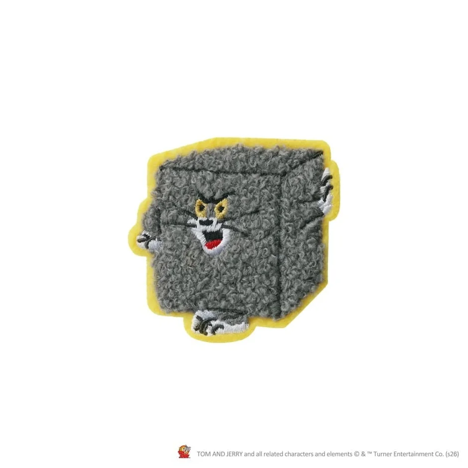 トムの顔がデザインされたサガラステッカー